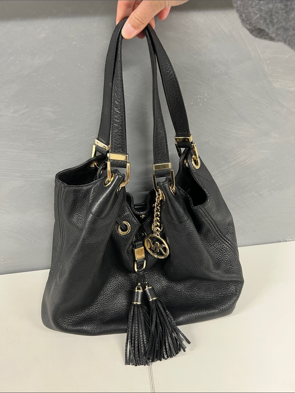 Michael Kors Black Leather Hobo with Gold Hardware and Tassels